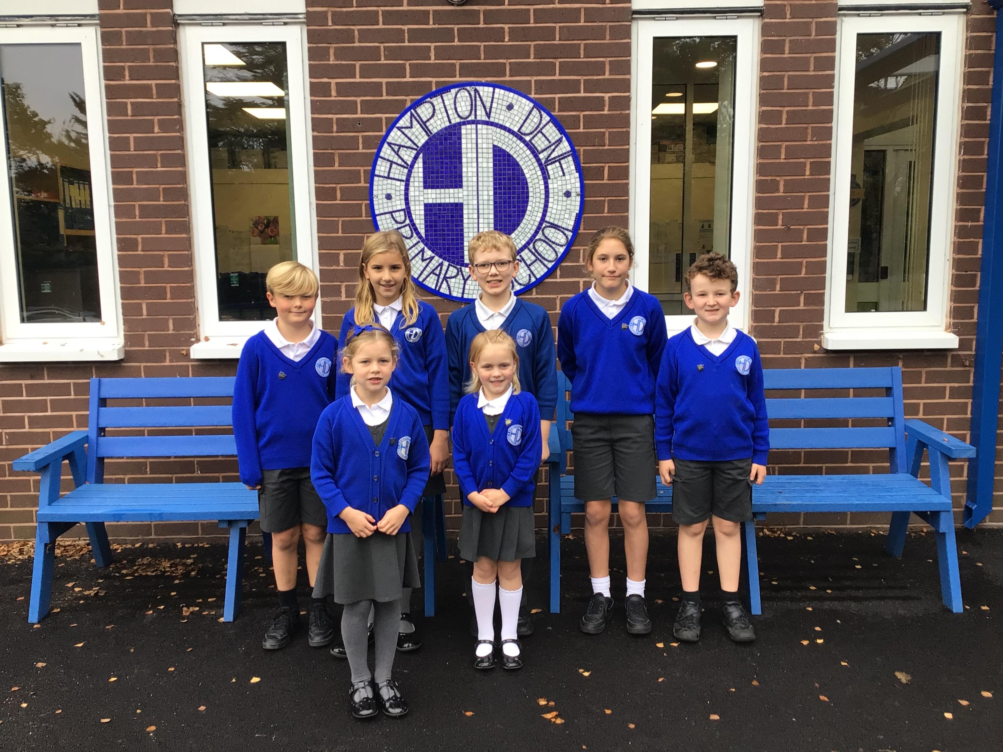 The children posing proudly with their new School Council badges! 